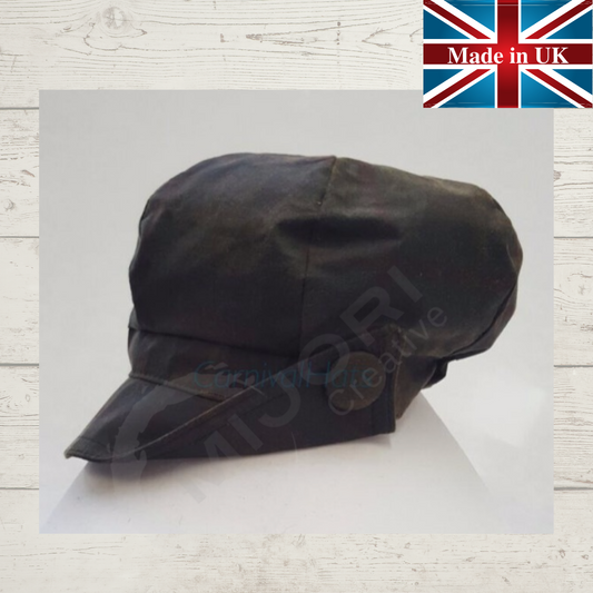 The Lilly baker boy hat with a button accent